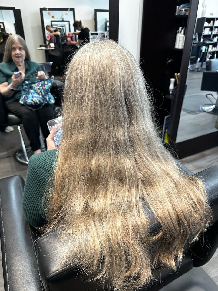 Hair before a big chop, seen from behind