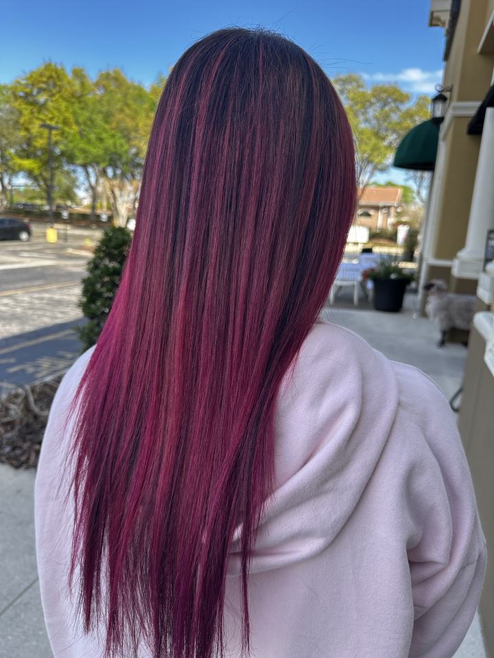 Hair after a vivid magenta color, seen from behind